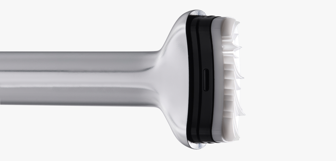 Close-up of the UNICOS Lower Eyelash Stamp head and its pre-cut lash pattern