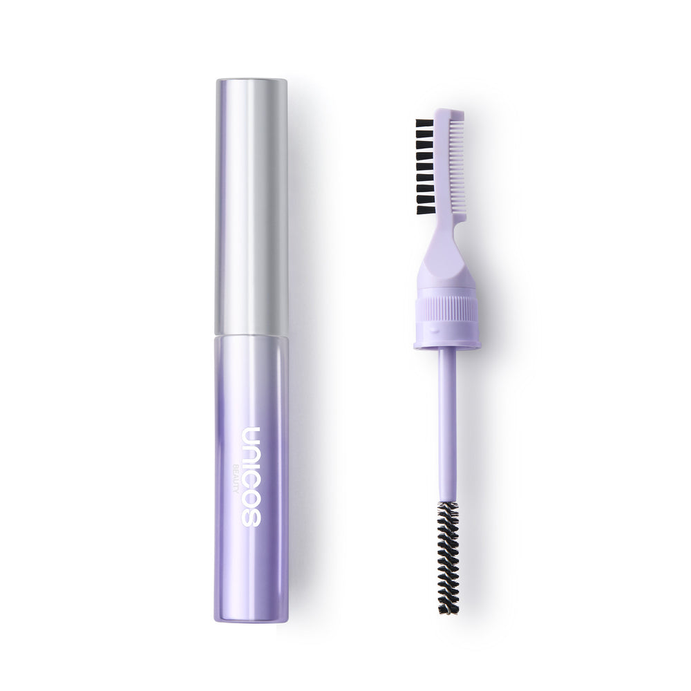 A lavender and silver cosmetic tube shown next to its applicator wand, which features a dual-ended brush head with black bristles and a lavender twist-up applicator. The brand name 'uniboo' is printed vertically on the tube.