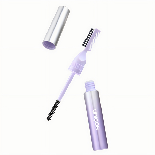 B-Lift Eyebrow Gel: A lavender and silver cosmetic applicator wand with a dual-ended brush and spoolie, shown alongside its cap and open tube on a clean white background.