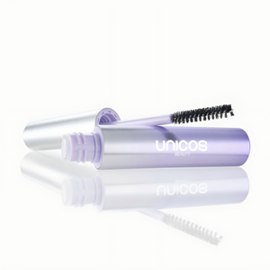 Eyebrow Brush & Gel Bundle: The B-Lift Eyebrow Gel tube unscrewed on a reflective white surface.